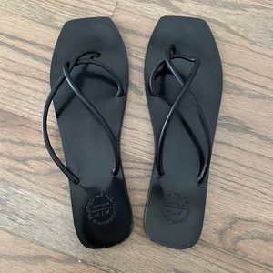 ATP flat minimal black leather sandals
